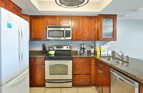 Madeira Beach Condo | Stay On The Beach and Directly Across From Johns Pass Village. Beautifully Furnished!