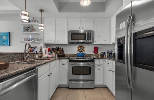 Navarre Beach Condo | Stay & Play | 🚲 Beachfront + Bikes, Kayaks, SUP & Pool Fun on Navarre Beach 🌴