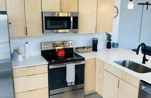 Traverse City Condo | Stay, play, relax- Sleeps 4, close to downtown with rooftop hot tubs!