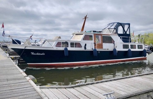 Vechelde Boat Rental | Stay with Maritime Flair on a Vintage Yacht