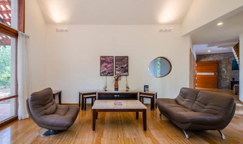 Somvarpet Villa | StayVista at Acacia Villa One - Free Breakfast, Pool, Gym & Indoor Games