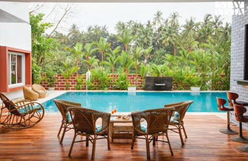 Nagaon Villa | StayVista at Azure Bliss with Huge Pool, BBQ, Wi-Fi
