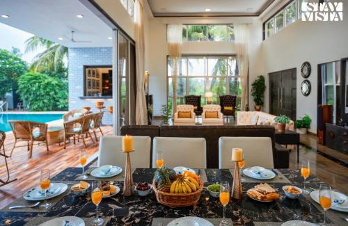 Nagaon Villa | StayVista at Azure Bliss with Huge Pool, BBQ, Wi-Fi