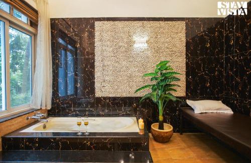 Nagaon Villa | StayVista at Azure Bliss with Huge Pool, BBQ, Wi-Fi