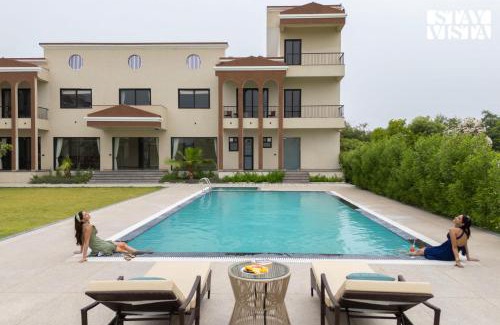 Jaipur District Villa | StayVista at Eleganza Villas with BBQ, Lawn, Bonfire
