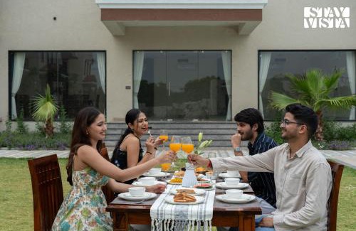 Jaipur District Villa | StayVista at Eleganza Villas with BBQ, Lawn, Bonfire