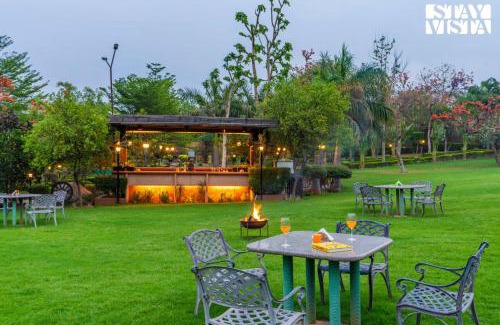 Sohna Villa | StayVista at Maple Farms with Pool, BBQ & Bonfire