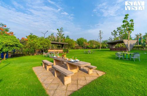 Sohna Villa | StayVista at Maple Farms with Pool, BBQ & Bonfire