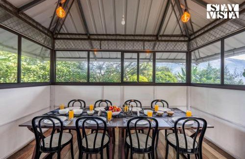 Udumbanchola House | StayVista at Misty Village - BBQ, Bonfire & Meals