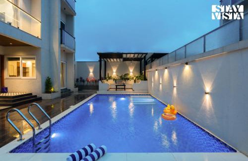 Khodala Villa | StayVista at Oriana Palms with Wifi and Pool