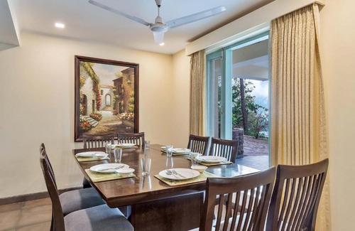 Dharampur Villa | StayVista at Panorama Estate with cosy seating