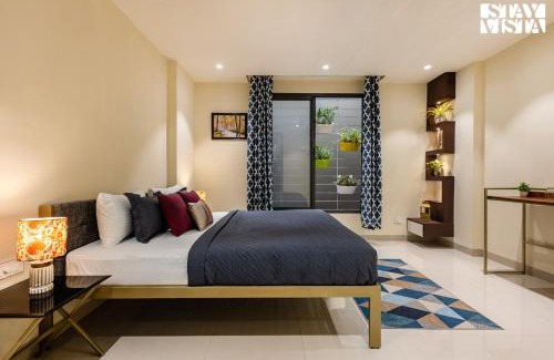Mahmoorganj Apartment | StayVista at Sunrise Apartment with Heater, WiFi