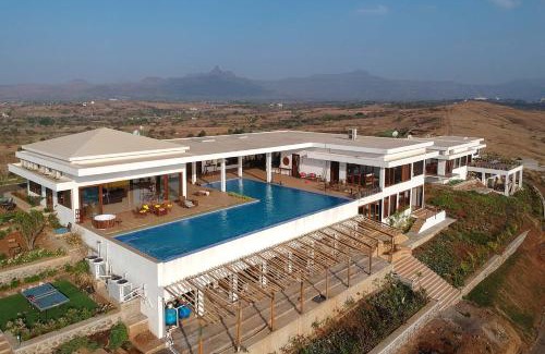 Igatpuri Villa | StayVista at Sunset on the Lake - Infinity Lakeview Swimming Pool with Contemporary Interiors & Lavish Amenities