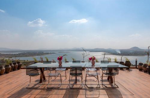 Igatpuri Villa | StayVista at Sunset on the Lake - Infinity Lakeview Swimming Pool with Contemporary Interiors & Lavish Amenities