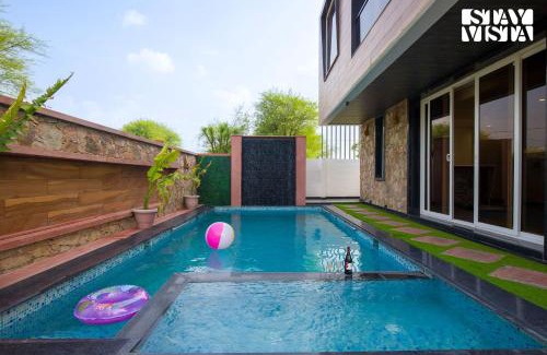 Amer Villa | StayVista at Talin Farms with Mountain View, Pool