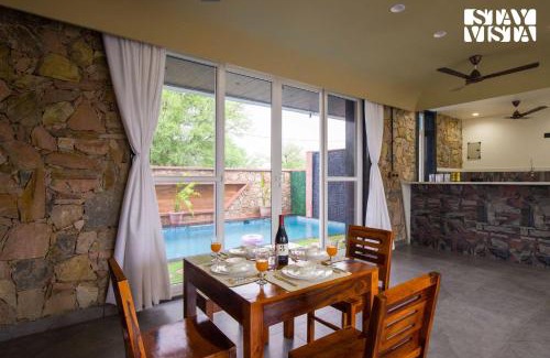 Amer Villa | StayVista at Talin Farms with Mountain View, Pool