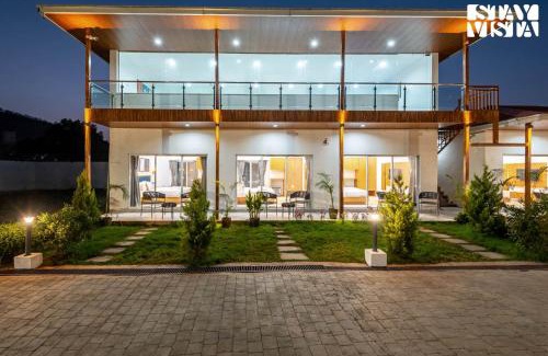 Karjat Villa | StayVista at The Grand Ten with lawn and pool