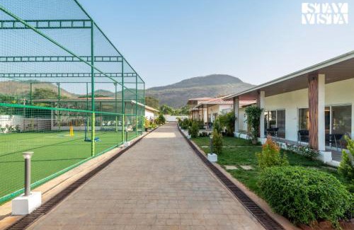 Karjat Villa | StayVista at The Grand Ten with lawn and pool
