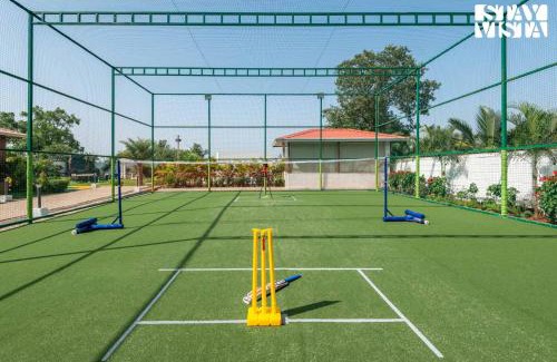 Karjat Villa | StayVista at The Grand Ten with lawn and pool