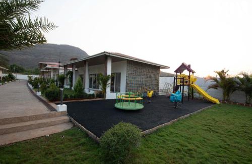 Karjat Villa | StayVista at The Grand Ten with lawn and pool
