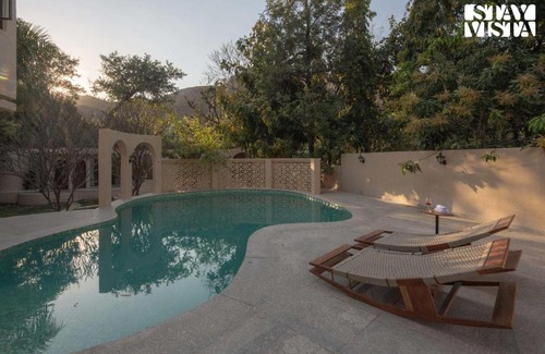 Bedla Villa | StayVista at Vanya Veda with Bathtub, Pool & Lawn