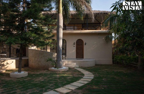 Bedla Villa | StayVista at Vanya Veda with Bathtub, Pool & Lawn