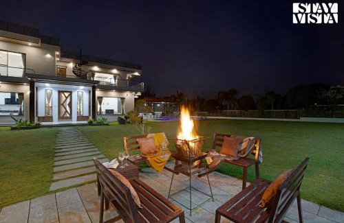 Bedla Villa | StayVista's Bella Dream - Mountain-View with Outdoor Pool, Lawn featuring a Gazebo & Indoor Games
