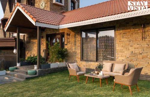 Anjaneri Villa | StayVista's Cerenity Castle - Lakeside Haven with Hill-View, Terrace & Indoor Entertainment