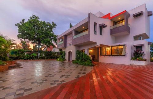 Khandala Villa | StayVista's Fairfield Villa - A green lawn and charming orchard await your retreat