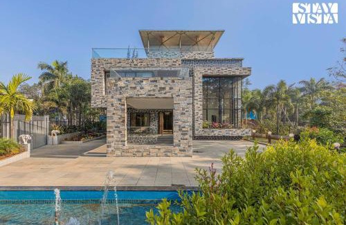 Kune Village Villa | StayVista's Greystone Estate with Pool, Theater, Terrace, and Snooker Table