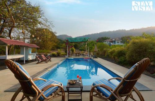 Alibaug Villa | StayVista's House Below The Hill - A stylish Mountain-view villa with Pool and Games room