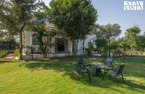 Kalwad Kalan and Khurd Villa | StayVista's Nature Ville - City Escape with Terrace-Balconies with View, Lawn & Gazebo