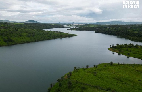 Wadgaon Villa | StayVista's Rivulet Waters - Lakefront Villa with Infinity Pool, Jacuzzi, Lawn, and Rustic Gazebo