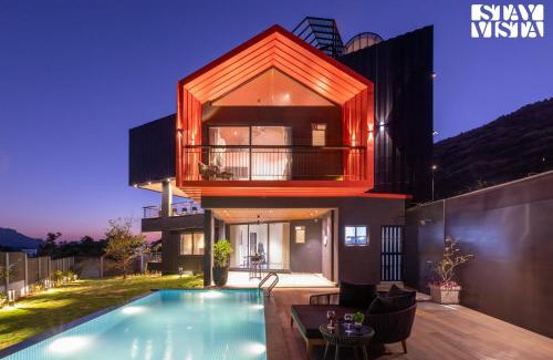 Nashik Villa | StayVista's Terra Tints - Mountainside Cabin with Private Pool, Deck & Games Room