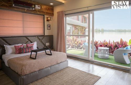Igatpuri Villa | StayVista's The Aquamarine Villa - Igatpuri - Lakeside Retreat with Infinity Pool & Deck, Theatre Room & Gazebo