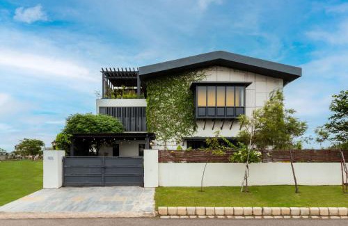Chandigarh Villa | StayVista's The Barn House - Farm-View Villa with with bonfire, Indoor Pool & Bar