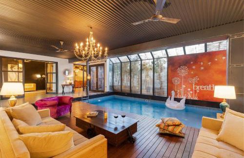 Chandigarh Villa | StayVista's The Barn House - Farm-View Villa with with bonfire, Indoor Pool & Bar