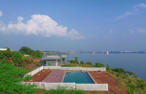 Igatpuri Villa | StayVista's Volendam Acres - Lake-View Villa with Pool, Amphitheatre & Turf