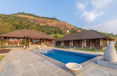 Lonavala Villa | StayVista's Vyoman Villa - Experience a valley view, lush lawn, spa, and yoga retreat