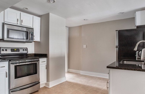 Truxton Circle House | Stellar NoMa 1BR w/ Backyard & W/D, nr Restaurants, by Blueground