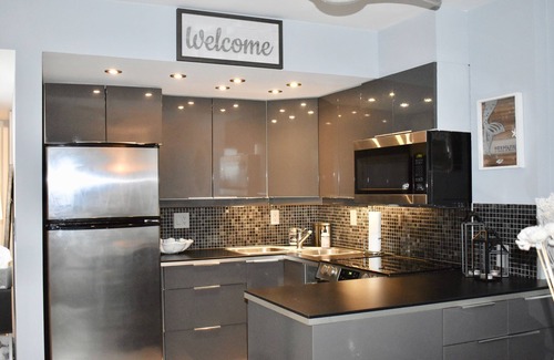 Vanderbilt Beach Apartment | Steps from bluebill beach with stunning sunsets from your balcony.