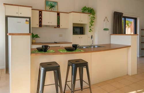 North Ward Apartment | Steps from The Strand 2BR & 2BA Riviera Retreat, Pool & Castle Hill Views