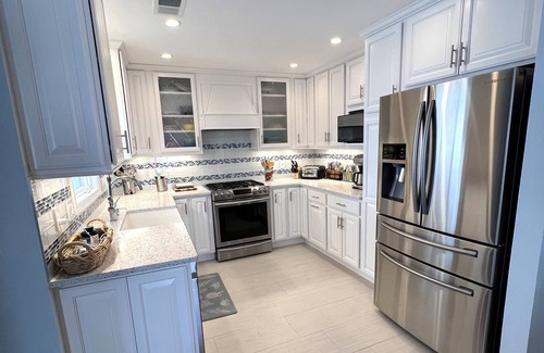Point Pleasant Beach House | Steps from beach/boardwalk! Ocean views and hot tub! Parking Included!