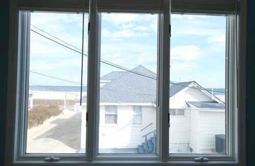 Point Pleasant Beach House | Steps from beach/boardwalk! Ocean views and hot tub! Parking Included!