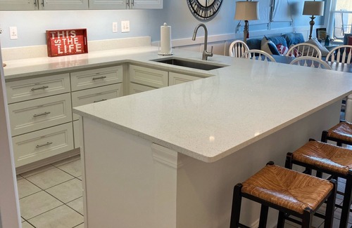Tybee Island Condo | Steps to Beach! Gated garage. Park, 1 min.walk to restaurants and town. 5 Star!