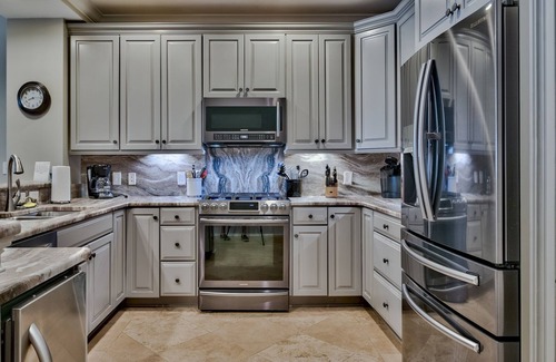 Crystal Beach Condo | Steps to the Gulf and private beach, heated pool, gym; walk to food and fun!