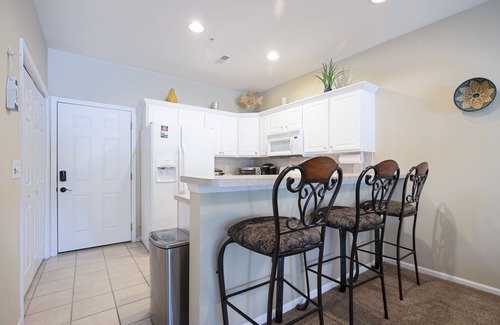 Camdenton Condo | Steps to Water, Serene View, Updated Condo Family Fun w/3 Pools in Camdenton