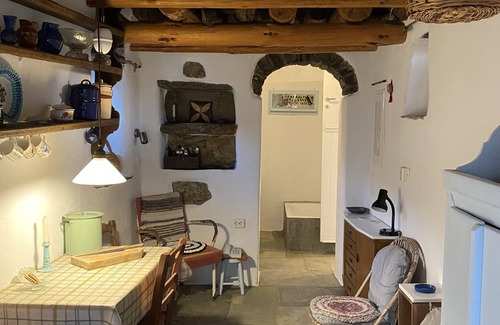 Andros Cottage | Stone-built cottage with glorious views on its own hillside