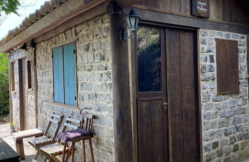 Praia Grande Ski Chalet | Stone Cottage in Pontal do Atalaia