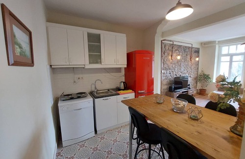Kabatas House | Stone Garden Apartment in the Heart of the City